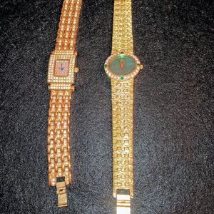Gold Watches with Green and Purple Accents